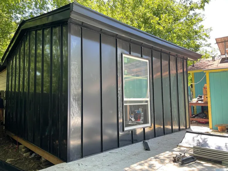 Black standing seam metal wall panels for Roof Inspection in Oxnard