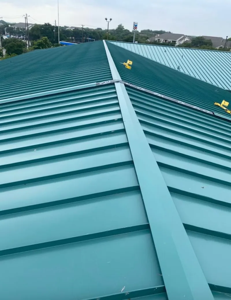 Green commercial metal roof ridge and valley for Metal Roof Repair in Oxnard